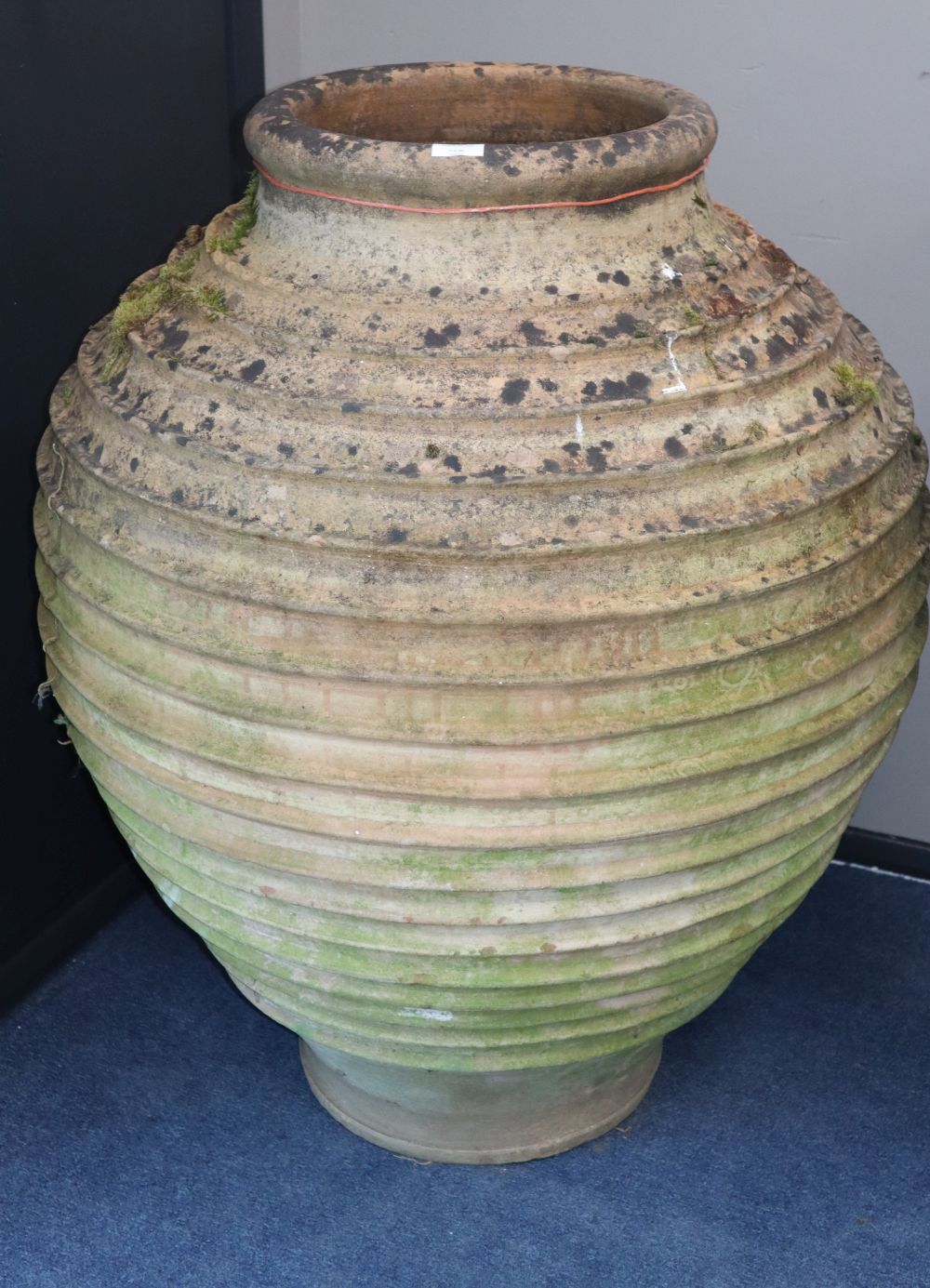 A large Grecian style weathered terracotta oil jar, H.95cm